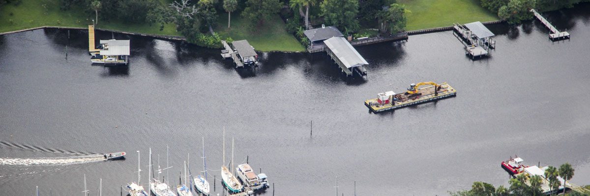 Aerial of a dredging barge on the Eau Gallie River