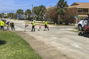 Crews working on Tarpon Avenue swales.
