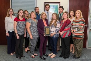 Finance-20181101-140722 Finance staff with award