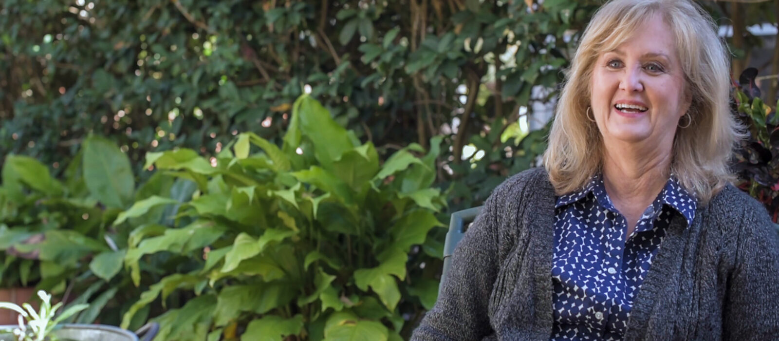 Deborah Weaver sitting in garden Deborah Weaver sitting in her garden