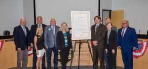 Dr. Shortelle surrounded by board members