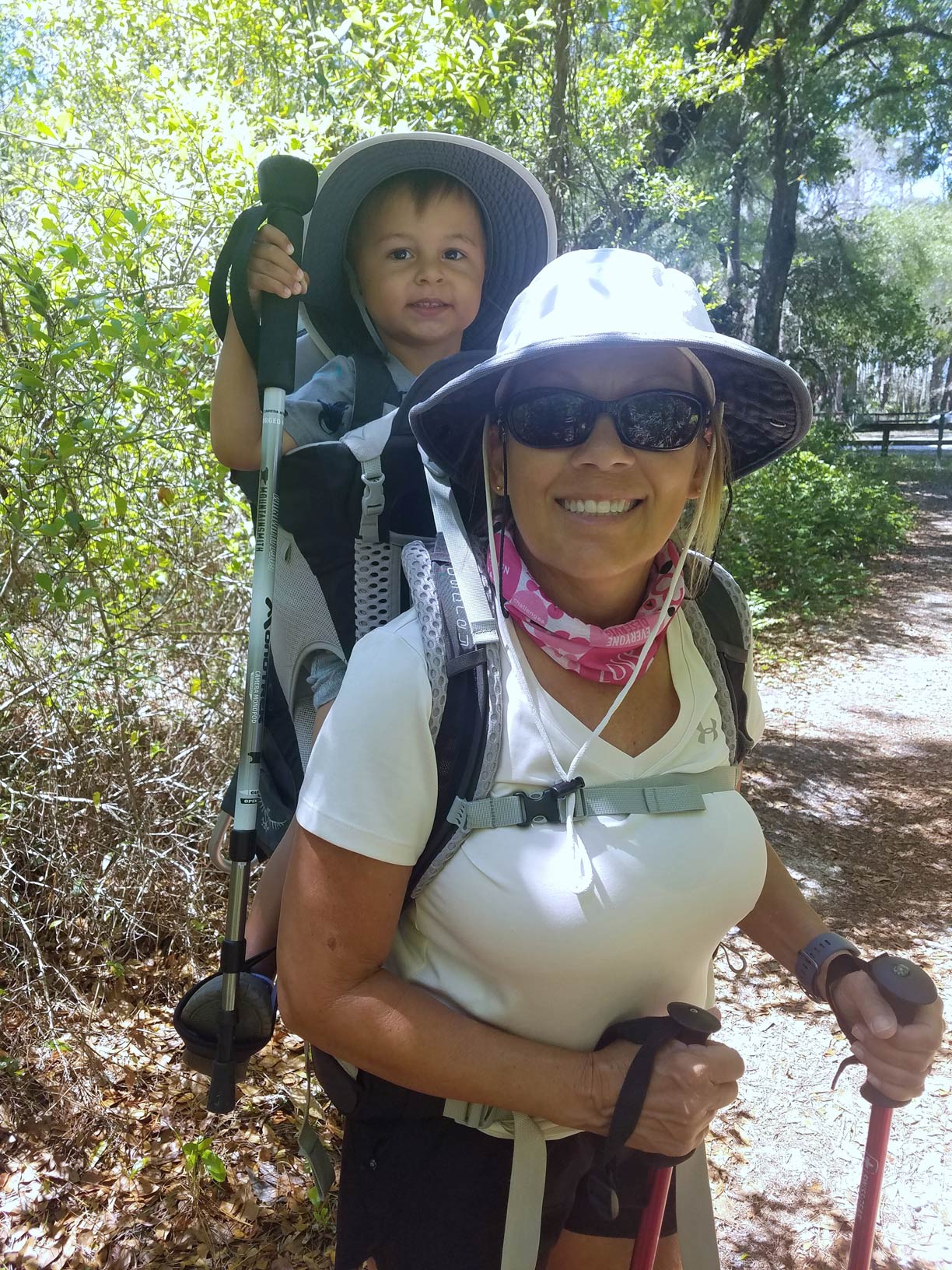 Cathy Lail and her grandson prepare for a hike into the woods to observe eagle nests.