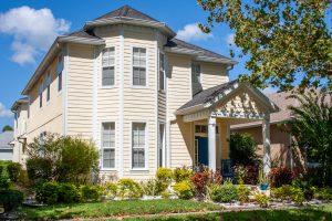 Scenic photo of a residence with landscaping