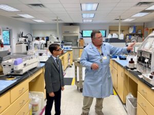 Young student tours laboratory